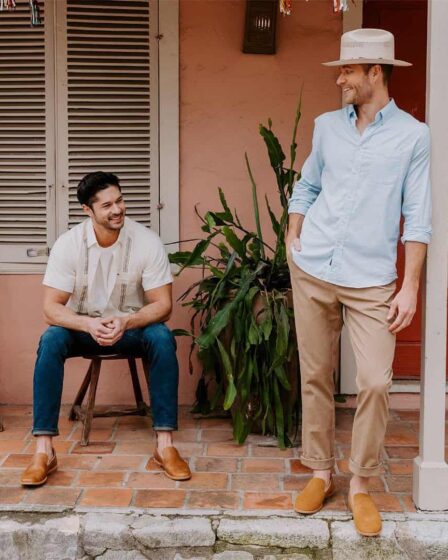 two men on the porch wearing slip-ons by tecovas